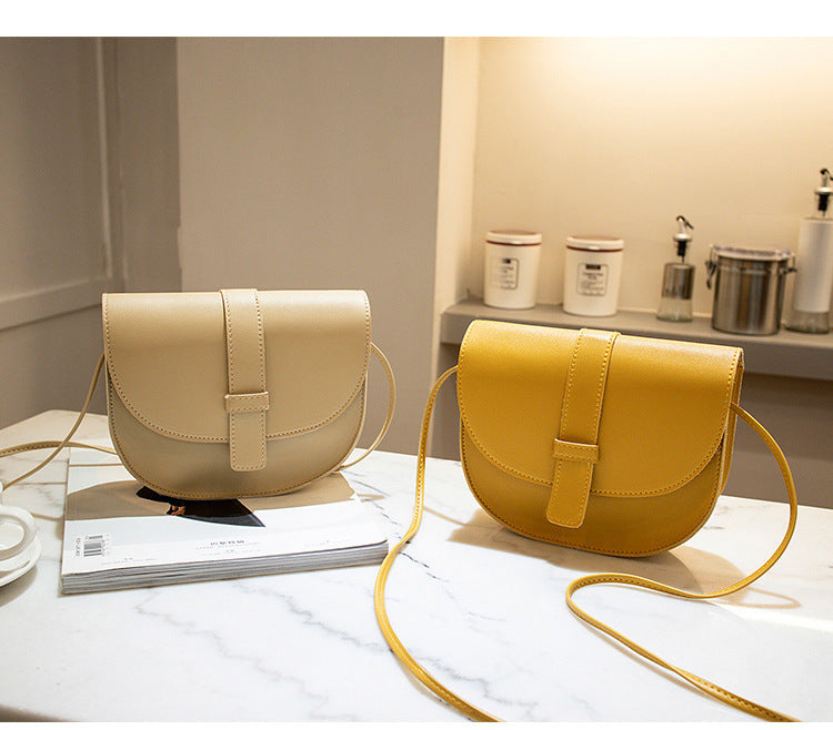 2022 summer new European and American style PU women's bag solid color saddle bag car stitching messenger shoulder small bag